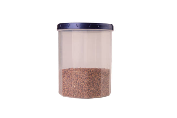 Buckwheat groats in plastic jars isolate