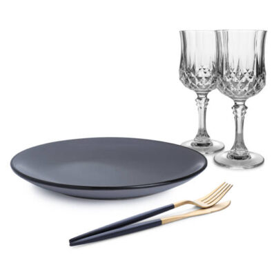 Clean plate, cutlery and glasses on white background